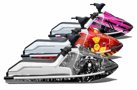 Kawasaki X2 650 jet skis shown in three custom graphic kit looks